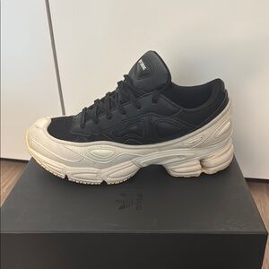 Raf Simons Black and White Sneakers Sleek Design